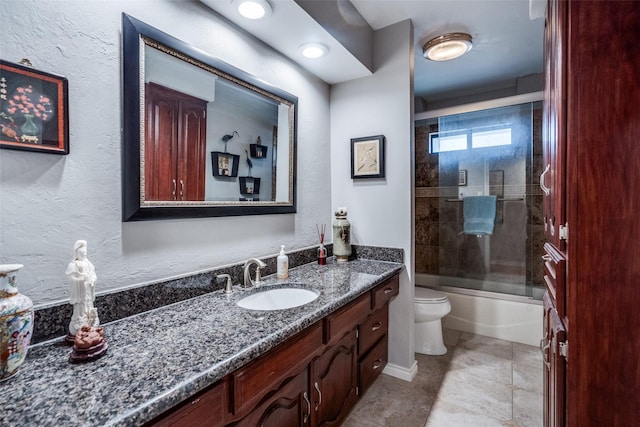 1520 Papeete Dr, Plano, TX 75075 - bathroom with toilet, vanity, and combined bath / shower with glass door