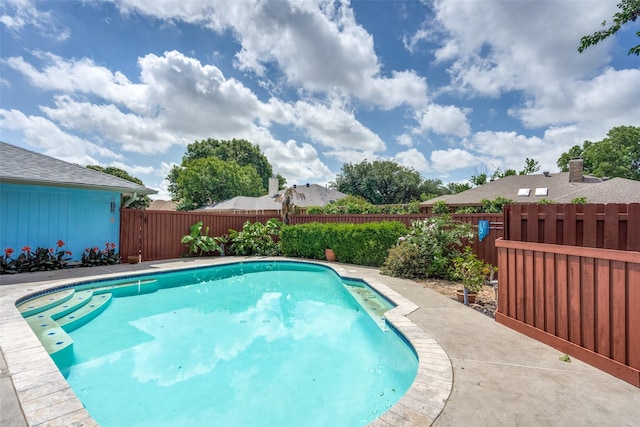 1520 Papeete Dr, Plano, TX 75075 - view of swimming pool with a fenced backyard