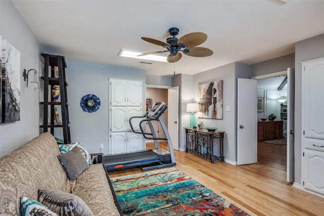 1520 Papeete Dr, Plano, TX 75075 - exercise room featuring ceiling fan, light wood-style flooring, and baseboards