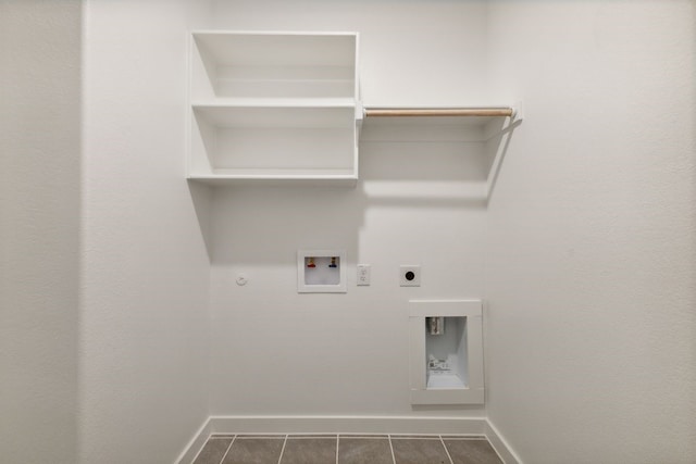 2745 Lopice Ln, Fort Worth, TX 76179 - laundry room with hookup for an electric dryer, hookup for a gas dryer, baseboards, washer hookup, and dark tile patterned floors