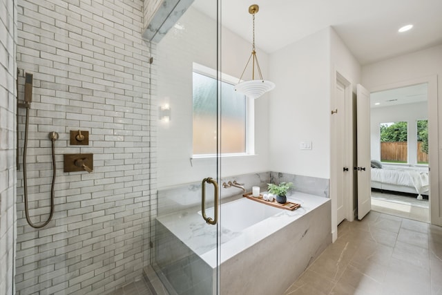 6244 Richmond Ave, Dallas, TX 75214 - full bath with a garden tub, a stall shower, connected bathroom, marble finish flooring, and recessed lighting