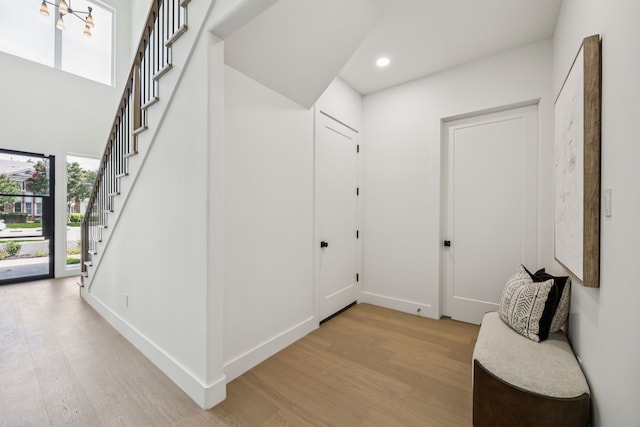 6244 Richmond Ave, Dallas, TX 75214 - entrance foyer with light wood-type flooring, stairway, recessed lighting, and baseboards
