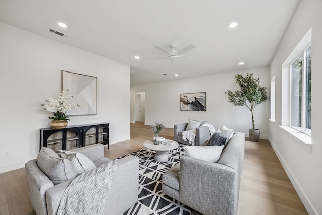 6244 Richmond Ave, Dallas, TX 75214 - living area featuring wood finished floors, recessed lighting, a ceiling fan, and baseboards