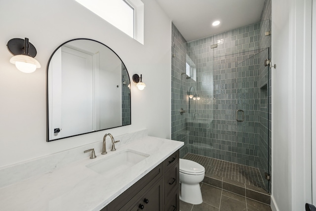 6244 Richmond Ave, Dallas, TX 75214 - full bathroom with vanity, a stall shower, toilet, tile patterned floors, and recessed lighting