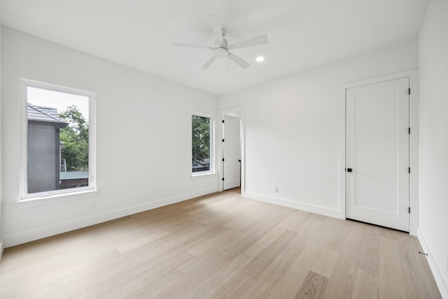 6244 Richmond Ave, Dallas, TX 75214 - empty room featuring light wood finished floors, baseboards, recessed lighting, and a ceiling fan