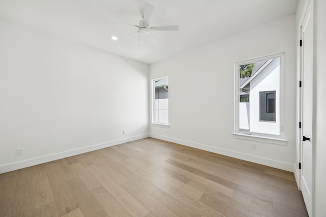 6244 Richmond Ave, Dallas, TX 75214 - empty room with baseboards, light wood-style flooring, ceiling fan, and recessed lighting