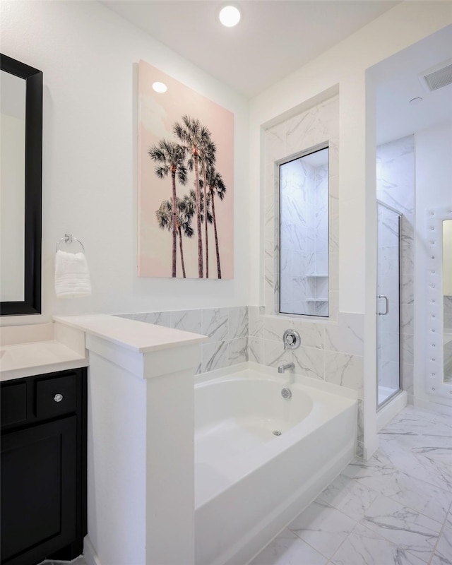 363 Somerville Dr, Mckinney, TX 75071 - full bath featuring a bath, vanity, marble finish floors, a stall shower, and recessed lighting