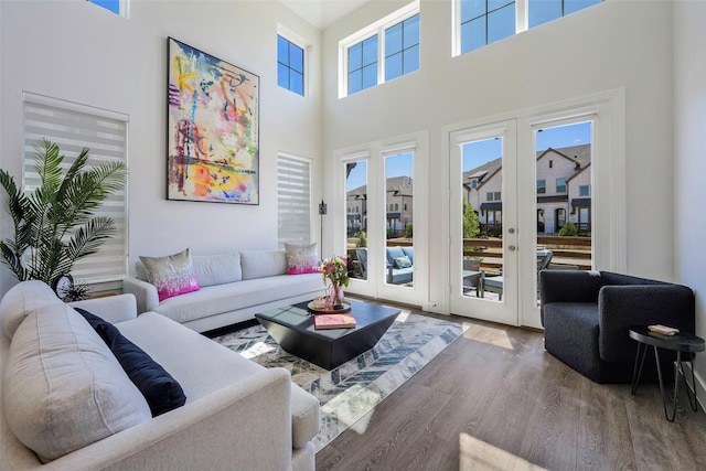 363 Somerville Dr, Mckinney, TX 75071 - living room featuring wood finished floors and a towering ceiling