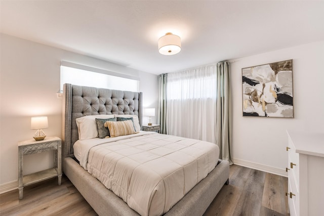 2617 Beechmont Dr, Dallas, TX 75228 - bedroom with wood finished floors and baseboards
