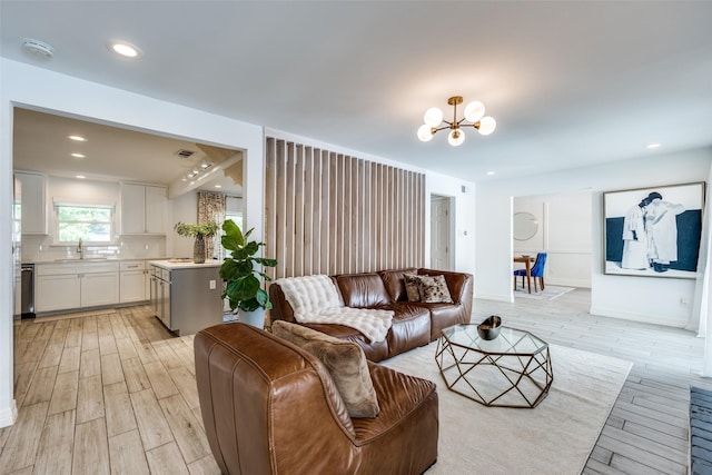 2617 Beechmont Dr, Dallas, TX 75228 - living room featuring light wood-style floors, a chandelier, and recessed lighting