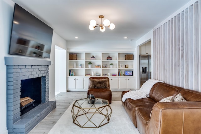 2617 Beechmont Dr, Dallas, TX 75228 - living area with a brick fireplace, a chandelier, and light wood finished floors
