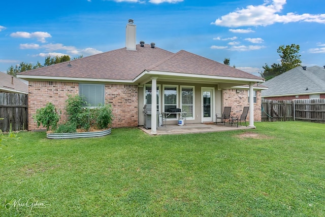 2198 Stockwell Rd, Bossier City, LA 71111 - rear view of property featuring brick siding, a patio area, a shingled roof, and a chimney