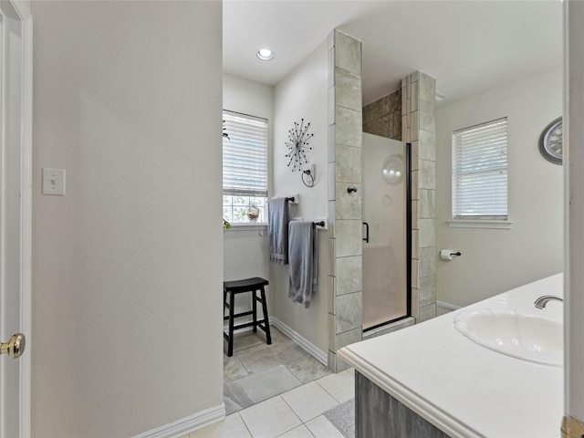 4710 Ashley Cir, Midlothian, TX 76065 - bathroom with a tile shower, tile patterned flooring, and vanity