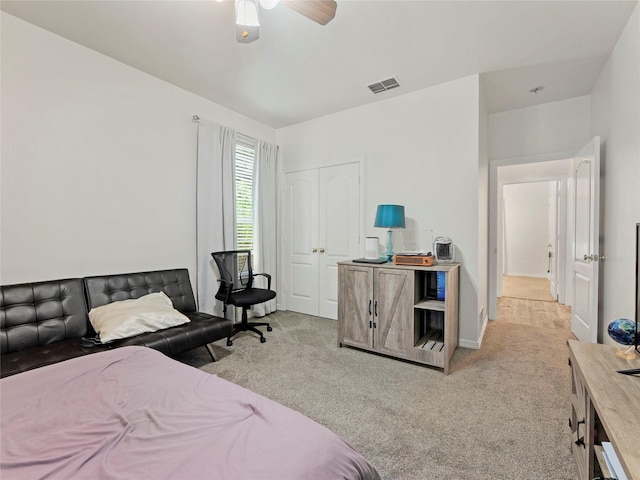 4710 Ashley Cir, Midlothian, TX 76065 - carpeted bedroom with a closet and a ceiling fan