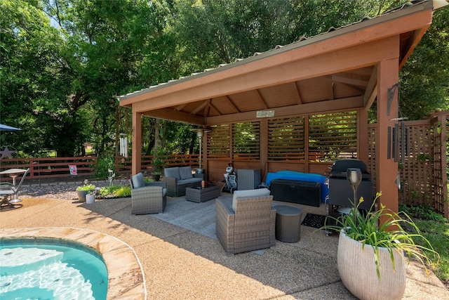 4710 Ashley Cir, Midlothian, TX 76065 - fenced backyard featuring a gazebo, an outdoor living space, a patio area, and a grill