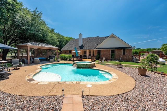 4710 Ashley Cir, Midlothian, TX 76065 - view of pool with a gazebo, a patio area, and a pool with connected hot tub
