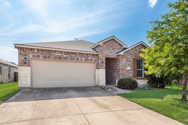 10237 Pyrite Dr, Fort Worth, TX 76131 - view of front of property featuring driveway, a front yard, brick siding, a garage, and stone siding