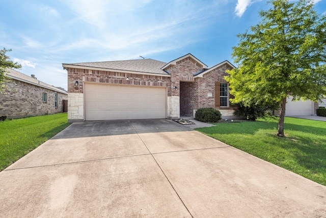 10237 Pyrite Dr, Fort Worth, TX 76131 - view of front facade with driveway, a front lawn, an attached garage, and brick siding