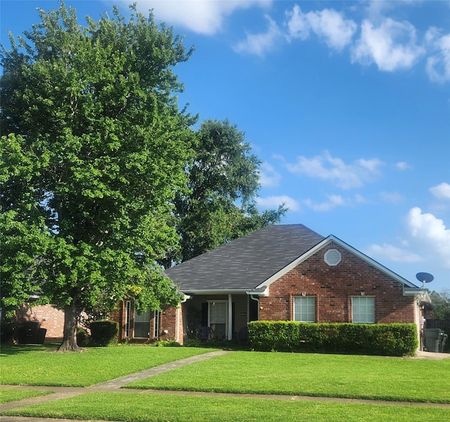 6100 Richmond Dr, Bossier City, LA 71111 - view of front of house with brick siding and a front yard