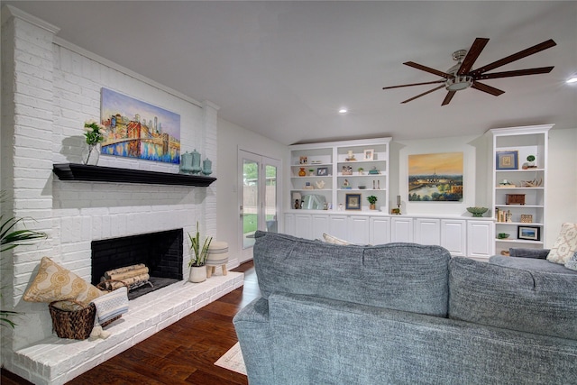 1220 Melony Dr, Sulphur Springs, TX 75482 - living room with a ceiling fan, a fireplace, wood finished floors, vaulted ceiling, and recessed lighting
