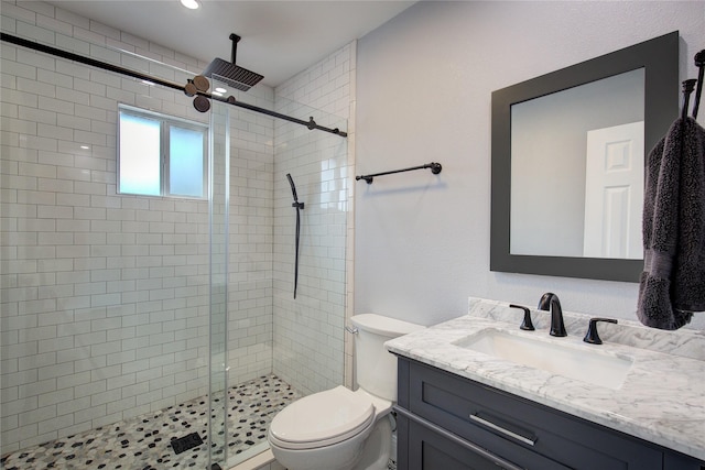 1220 Melony Dr, Sulphur Springs, TX 75482 - bathroom featuring vanity, a stall shower, and toilet
