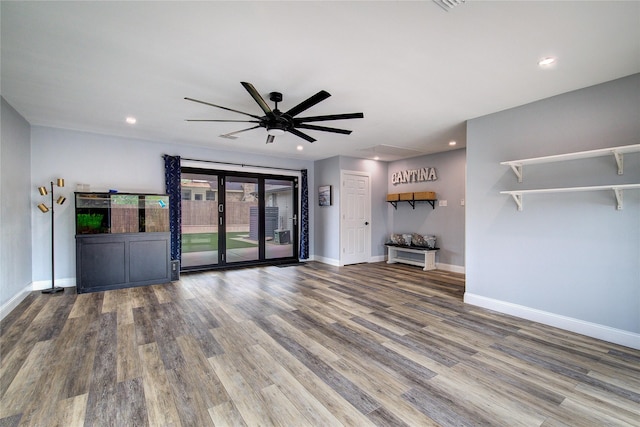 1220 Melony Dr, Sulphur Springs, TX 75482 - unfurnished living room featuring a ceiling fan, baseboards, wood finished floors, and recessed lighting