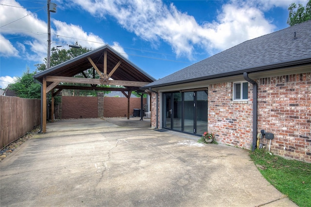 1220 Melony Dr, Sulphur Springs, TX 75482 - view of patio / terrace featuring a carport, a gazebo, and driveway