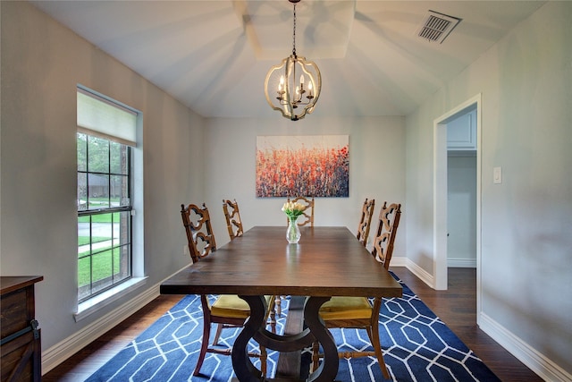 1220 Melony Dr, Sulphur Springs, TX 75482 - dining area with a chandelier, dark wood-style floors, and baseboards