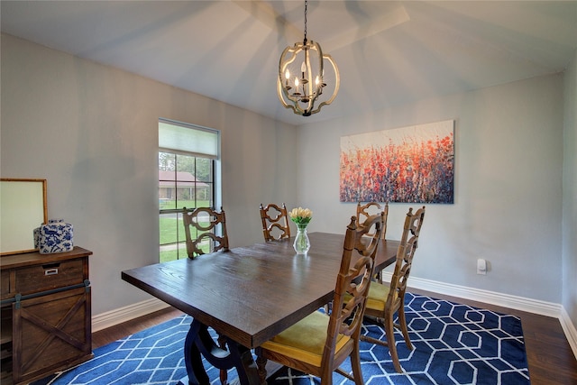 1220 Melony Dr, Sulphur Springs, TX 75482 - dining area featuring a chandelier, dark wood-style flooring, baseboards, and vaulted ceiling