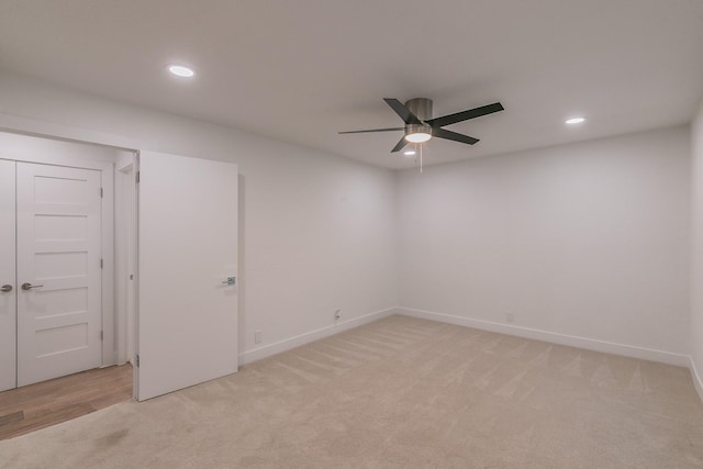 4851 Cedar Springs Rd Unit 175, Dallas, TX 75219 - empty room featuring light colored carpet, a ceiling fan, recessed lighting, and baseboards