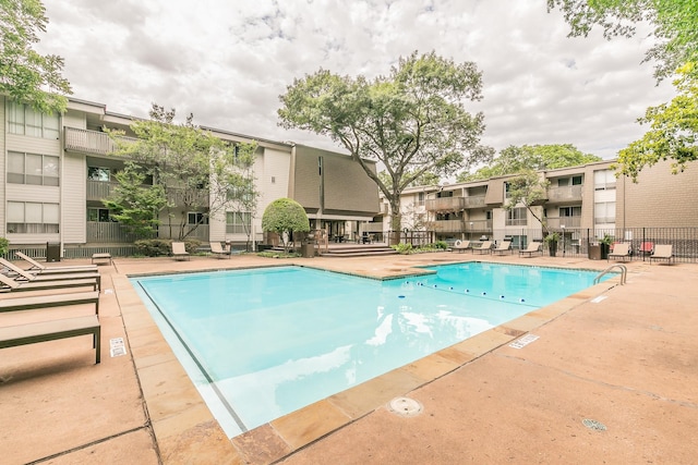 4851 Cedar Springs Rd Unit 175, Dallas, TX 75219 - community pool featuring a patio