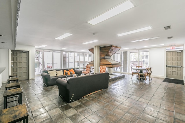 4851 Cedar Springs Rd Unit 175, Dallas, TX 75219 - living room with baseboards
