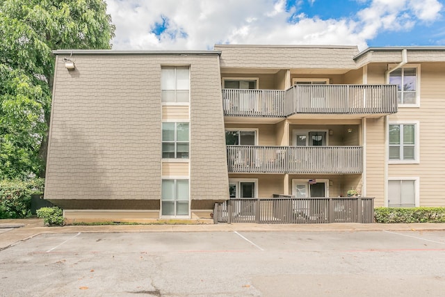 4851 Cedar Springs Rd Unit 175, Dallas, TX 75219 - view of apartment building / complex featuring uncovered parking
