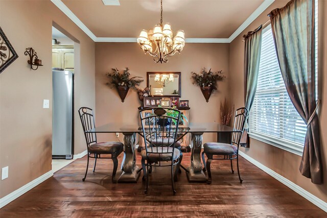 156 Buckskin Dr, Van Alstyne, TX 75495 - dining room with a chandelier, plenty of natural light, crown molding, and wood finished floors