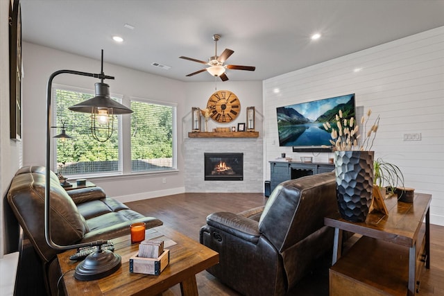 3204 Maplewood Dr, Mckinney, TX 75071 - living room with wood finished floors, a glass covered fireplace, a ceiling fan, and recessed lighting
