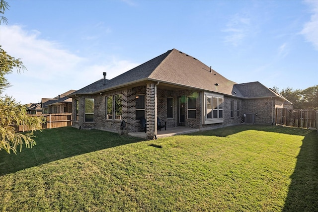 3204 Maplewood Dr, Mckinney, TX 75071 - back of house with brick siding, a fenced backyard, a patio area, and roof with shingles