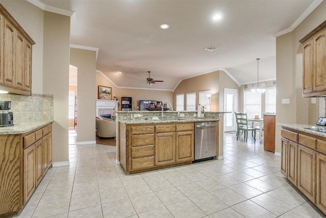2134 Lorrie Ln, Weatherford, TX 76087 - kitchen featuring ceiling fan, dishwasher, open floor plan, a tile fireplace, and tasteful backsplash