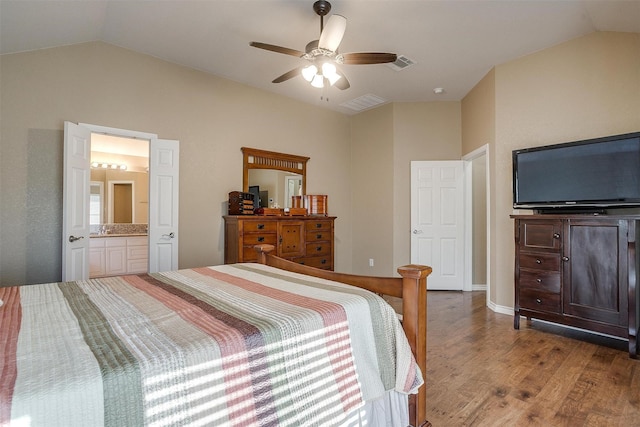 2134 Lorrie Ln, Weatherford, TX 76087 - bedroom with lofted ceiling, wood finished floors, ensuite bathroom, and a ceiling fan
