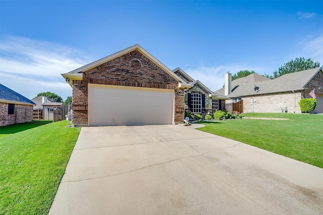 2134 Lorrie Ln, Weatherford, TX 76087 - view of front of home with brick siding, an attached garage, and concrete driveway