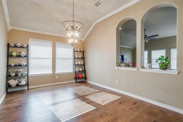 2134 Lorrie Ln, Weatherford, TX 76087 - empty room featuring arched walkways, a ceiling fan, wood finished floors, crown molding, and vaulted ceiling