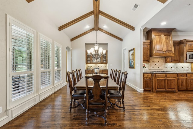 305 Crestfield Ct, Sunnyvale, TX 75182 - dining space with a chandelier, dark wood finished floors, recessed lighting, baseboards, and arched walkways