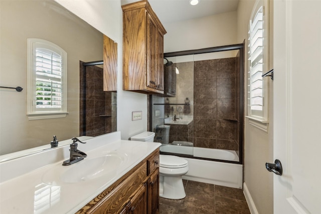 305 Crestfield Ct, Sunnyvale, TX 75182 - bathroom featuring toilet, vanity, shower / bath combination with glass door, and plenty of natural light