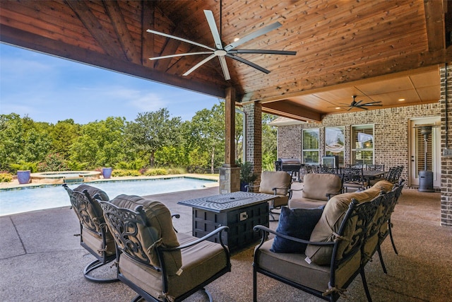 305 Crestfield Ct, Sunnyvale, TX 75182 - view of patio with ceiling fan, an in-ground hot tub, an outdoor pool, and outdoor dining space