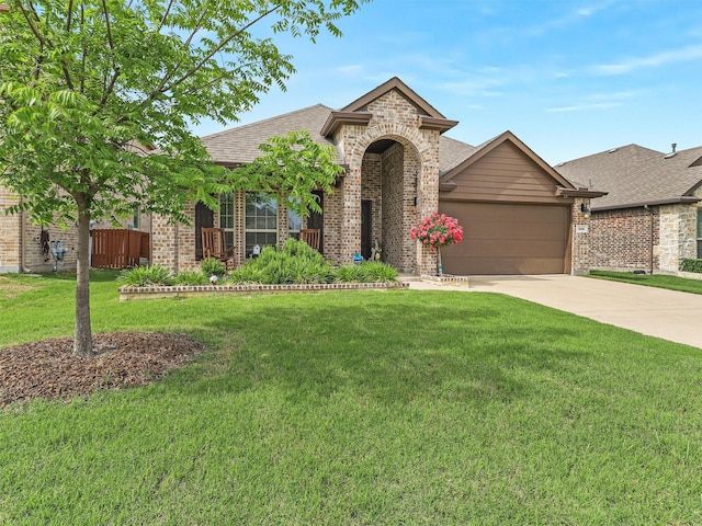 505 Maverick St, Anna, TX 75409 - view of front of house featuring brick siding, driveway, an attached garage, and roof with shingles