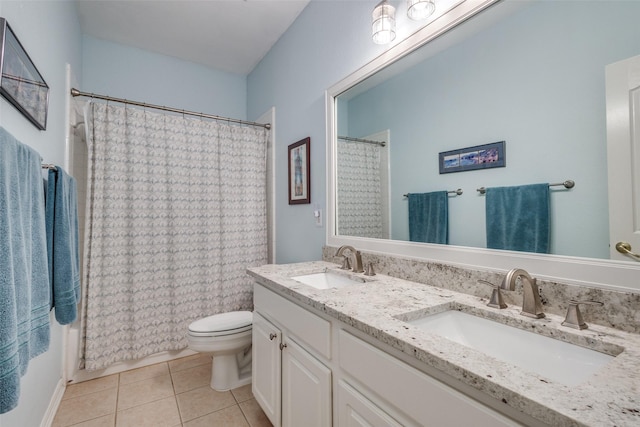 103 Belton Dr, Hickory Creek, TX 75065 - full bath with tile patterned floors, toilet, and double vanity