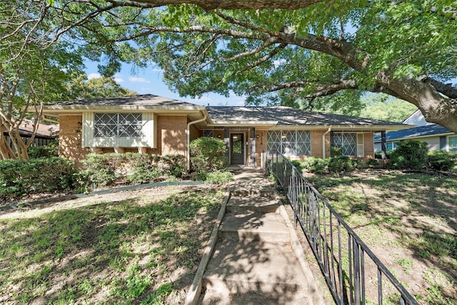 2118 Wooded Acres Dr, Waco, TX 76710 - single story home featuring brick siding