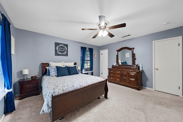 2118 Wooded Acres Dr, Waco, TX 76710 - bedroom featuring light colored carpet, ceiling fan, and baseboards