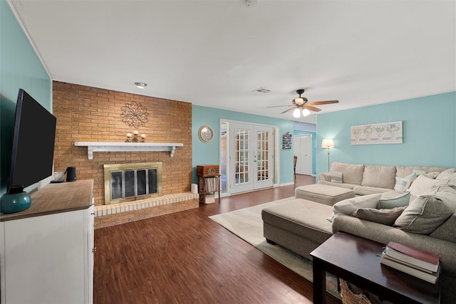 2118 Wooded Acres Dr, Waco, TX 76710 - living area with a ceiling fan, wood finished floors, a fireplace, and french doors