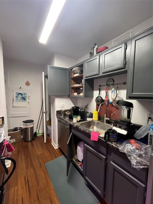 18333 Roehampton Dr Unit 1125, Dallas, TX 75252 - kitchen with dishwasher, dark countertops, dark wood finished floors, open shelves, and a sink