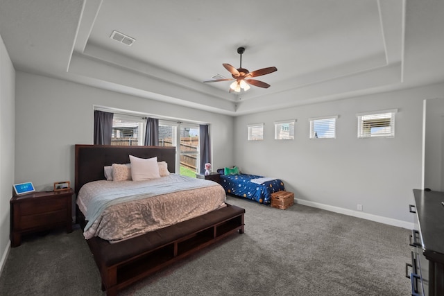 612 Wildriver Trl, Fort Worth, TX 76131 - bedroom featuring a tray ceiling, carpet, baseboards, and a ceiling fan